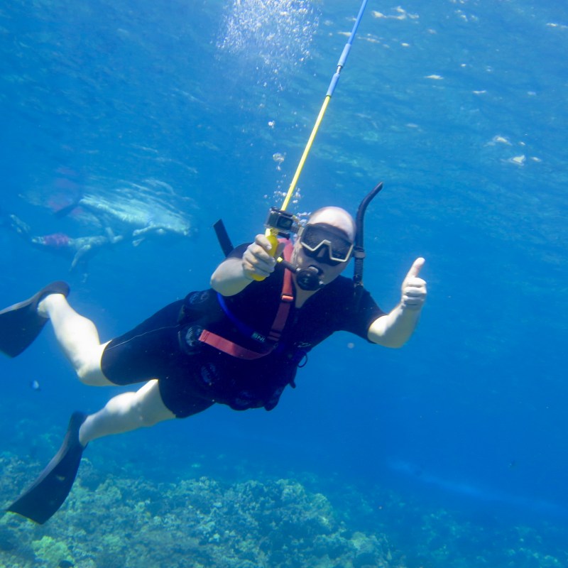 Man poses for portrait underwater