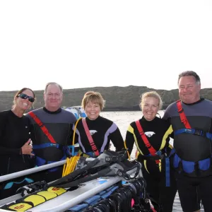 a group of people posing for the camera